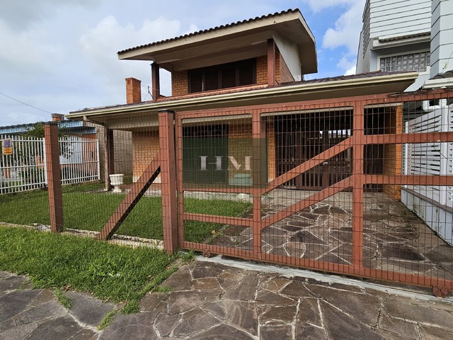 #519 - Casa fora de condomínio para Venda em Xangri-lá - RS