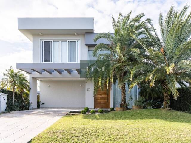 #573 - Casa em condomínio para Venda em Xangri-lá - RS
